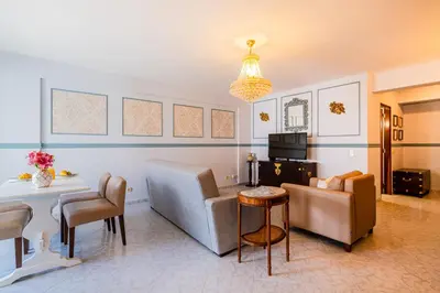 a living room with a couch and a table at Apartment Solera in Albufeira