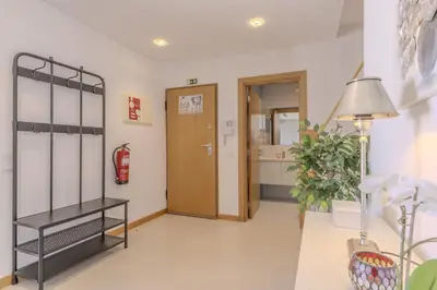 a room with a hallway with a door and a lamp at #340 Old Town Garden Hill Z by Home Holidays in Albufeira
