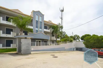 a house with a sign in front of it at Pinheiro Residence - Dream Lodging in Albufeira