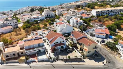 an aerial view of a city with houses and the ocean at Vivenda Lemos A in Albufeira