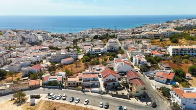 an aerial view of a city with the ocean at Vivenda Lemos B in Albufeira
