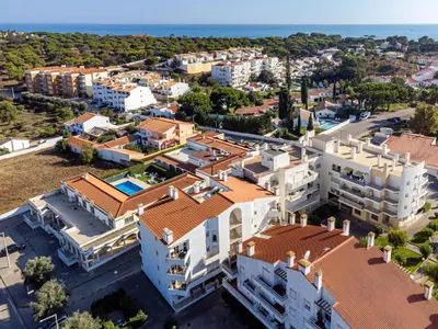 an aerial view of a villa in a resort town at Falésia Beach I by HelloVacations in Albufeira