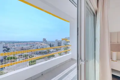 a balcony with a view of a city at Alexandra Paradise in Albufeira