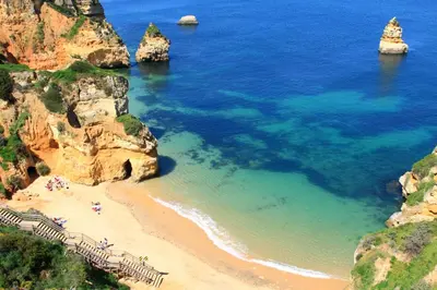 a view of a beach with people on it at Nordic Breeze in Quarteira