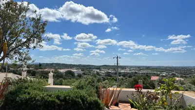 a view of a city from the roof of a house at The Lemon Tree House by IntiHolidays in Boliqueime