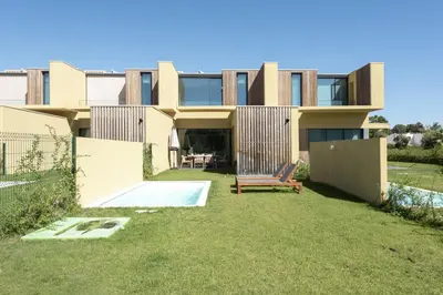 a house with a backyard with a swimming pool at Vilamoura Parque - Luxury Villa with pool by HD in Vilamoura