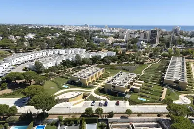 an aerial view of a city with buildings at Vilamoura Parque - Luxury Villa with pool by HD in Vilamoura