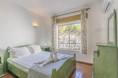 a bedroom with a bed and a window at #348 Apartment Madaleno by Home Holidays in Roja- Pé