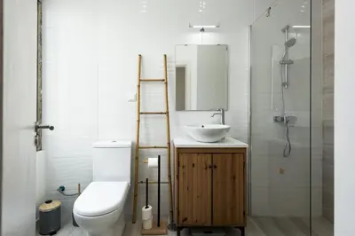 a bathroom with a toilet and a sink and a shower at Marggisa - City Center by HD in Faro