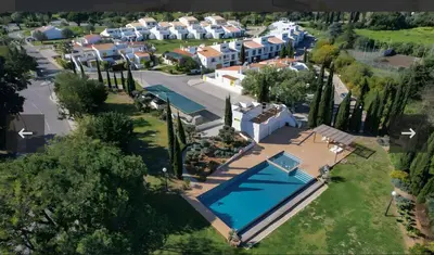 an aerial view of a villa with a swimming pool at Villa Soligolf - Vilamoura, Algarve in Quarteira
