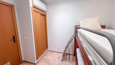 a hospital room with a bunk bed in it at Ocean View Quarteira in Quarteira
