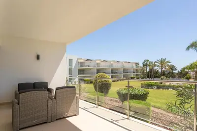 a balcony with a view of a building at Snazzy Varandas do Castelo One-Bedroom Apartment sleeps 2 person in Albufeira