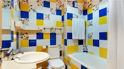 a bathroom with a toilet and a sink and a tub at Charming Orada 2-Bedroom Albufeira Duplex Apartment with Shared Pool sleeps 6 in Albufeira