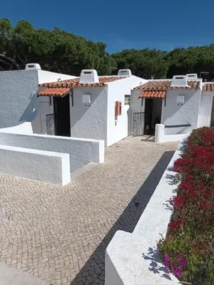 a row of white houses with red roofs at Studio Açoteias 410 in Albufeira