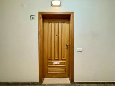 a wooden door with a light on top of it at Vilamoura Marina Beach With Pool by Homing in Vilamoura
