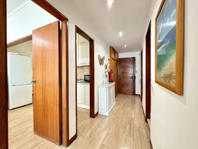 a hallway with an open door to a room at Quarteira Central 3 by Homing in Quarteira