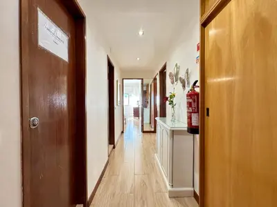 a corridor of a hallway with at Quarteira Central 3 by Homing in Quarteira