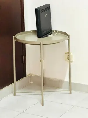 a black router sitting on a small table at Apartamento gourmet com quintal in Albufeira