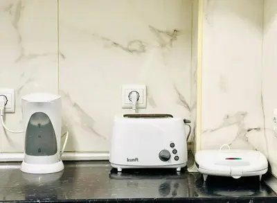 a blender and a toaster sitting on a counter at Amazing Space - 4 Bedroom in Albufeira