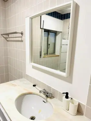 a stack of white towels sitting on a table at Apartment in Vilamoura Park in Quarteira