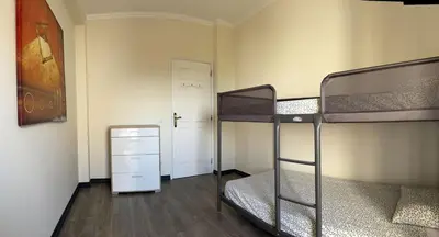 a room with two bunk beds and a door at Fabulous Praia dos Pescadores in Albufeira