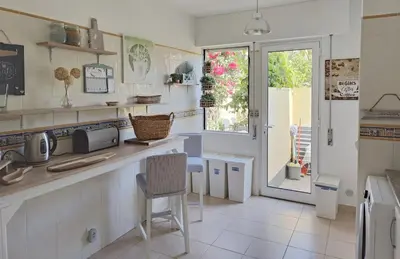 a bedroom with two beds and a mirror at Boa Vida in Vilamoura