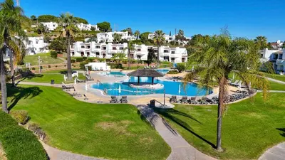 an aerial view of a resort with a swimming pool at My Inzu by HelloVacations in Albufeira