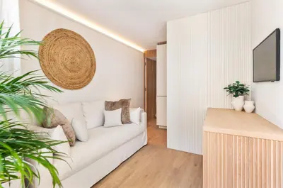 a white living room with a white couch at BLQ Charneco 1BDR in Boliqueime by LovelyStay in Boliqueime