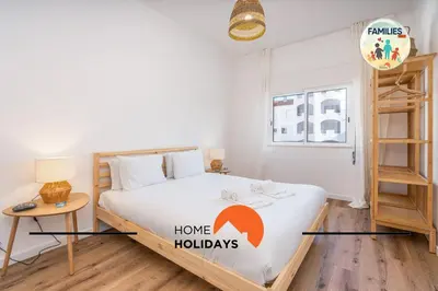 two men are flying in the air at #281 Families Only -Telecomunicacoes Home Holidays in Albufeira