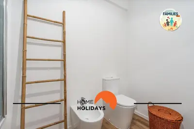 a kitchen with white cabinets and a stove top oven at #281 Families Only -Telecomunicacoes Home Holidays in Albufeira