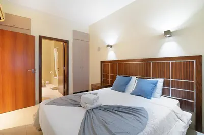 a large living room with a couch and a table at Paraiso do Atlantico in Albufeira