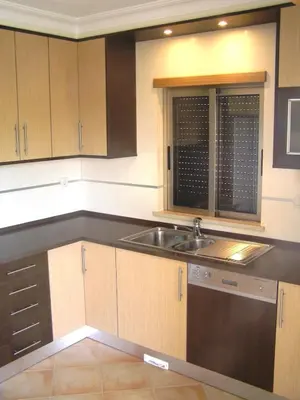 a kitchen with a sink and a counter top at ABF38, encantadora Villa V4 em lugar sossegado in Guia