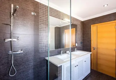 a bathroom with a sink and a shower at Villa Sierra in Guia