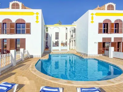 a swimming pool in the courtyard of a house at Holiday Home Chalet Villa Albuar mit eigenem Pool by Interhome in Albufeira