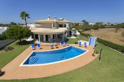 an aerial view of a house with a swimming pool at Villa Anthony by Villa Plus in Terras Novas