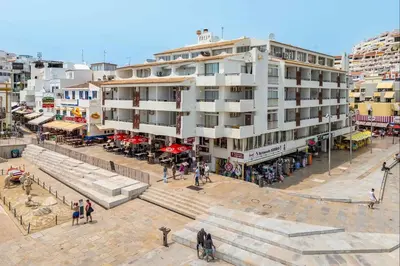 an overhead view of a street with a building at Rocco del Mar by Portucasa in Albufeira
