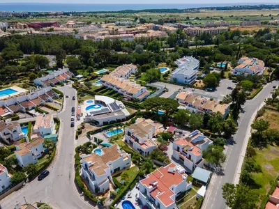 an aerial view of a resort at Villa Navegante com Piscina Privada em Vilamoura in Quarteira