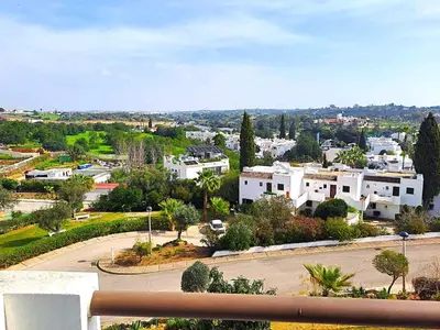 a view of a city with white buildings at Superior Two Bedroom Apartment in Clube Albufeira in Albufeira
