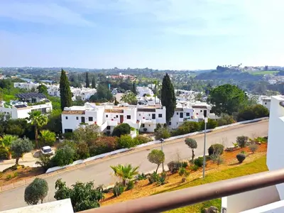 a view of a city with houses and a road at Superior Two Bedroom Apartment in Clube Albufeira in Albufeira