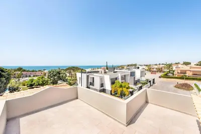 a view of the ocean from the balcony of a house at Villa Gale Coast in Guia