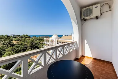 a balcony with a view of the ocean at Le Bleu de la Mer in Albufeira
