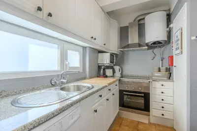a kitchen with a sink and a window at #347 Albufeira Dream Home by Home Holidays in Albufeira
