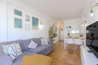 a living room with a couch and a table at #347 Albufeira Dream Home by Home Holidays in Albufeira