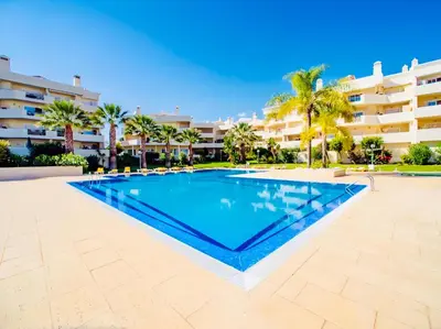 a large swimming pool in front of a building at Rooftop with sea views by Algarve Dream Holidays in Albufeira
