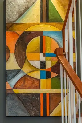 a painting of a woman on a staircase at Casa da Porta da Praia - 3 Bedroom Castle Wall House in Albufeira