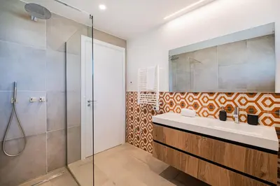 a bathroom with a sink and a shower at Casa Joaninha - Heated pool - Algarve in Algoz