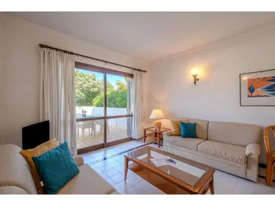 a bedroom with a bed with two towels on it at Apartment Rita - Sunny Way by Interhome in Albufeira