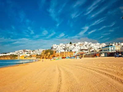a view of a beach with buildings in the background at Apartment Rita - Sunny Way by Interhome in Albufeira