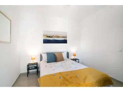 a dining room with a white table and chairs at Apartment Jade-Sunny Way by Interhome in Albufeira