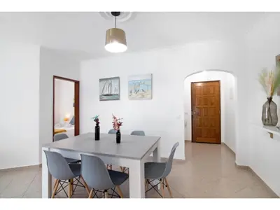 a living room with a couch and a chair at Apartment Jade-Sunny Way by Interhome in Albufeira